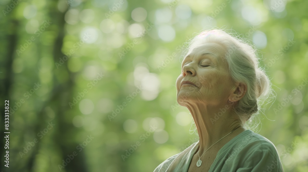 Senior Woman Breathing Fresh Air in Sunlit Forest Senior Woman Breathing Fresh Air in Sunlit Forest