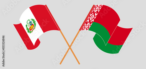 Crossed and waving flags of Peru and Belarus