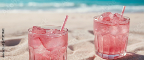 Pink cocktail on the tropical beach