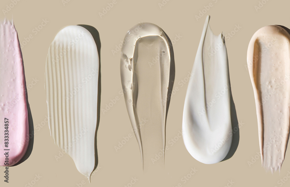 cosmetic smears cream texture on pastel background cosmetic smears cream texture on pastel background