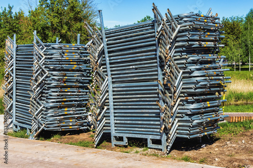 dismantled metal supports for construction scaffolding and formwork photo