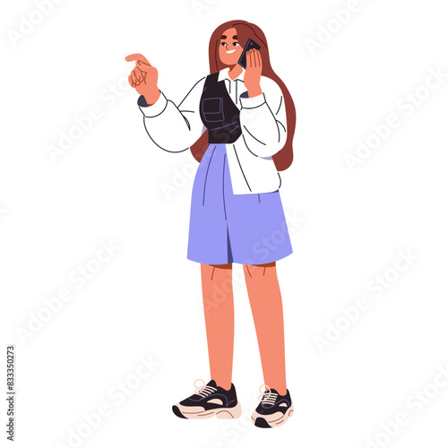 Cute girl talks by smartphone. Stylish young woman pointing with finger during phone call. Happy teenager communicates by telephone, makes hand gestures. Flat isolated vector illustration on white
