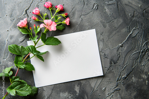 Blank card with pink flowers bouquet on grey background photo