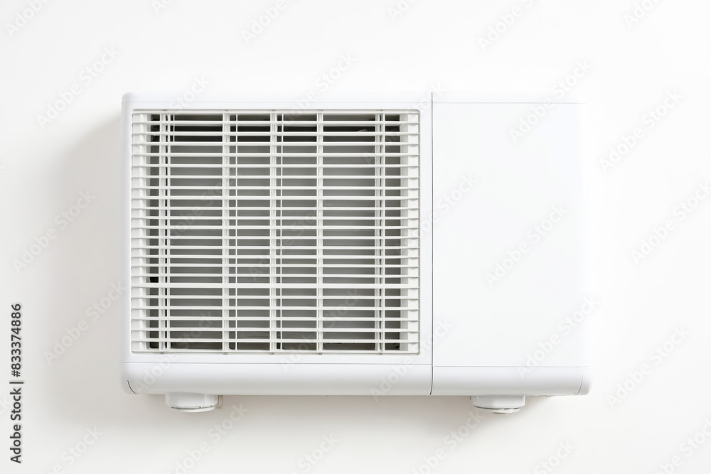 White Air Conditioner Unit on a White Wall White Air Conditioner Unit on a White Wall