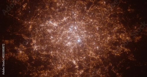 Paris (France) aerial view at night. Satellite view on modern city with street lights. Camera is flying above the city, moving forward