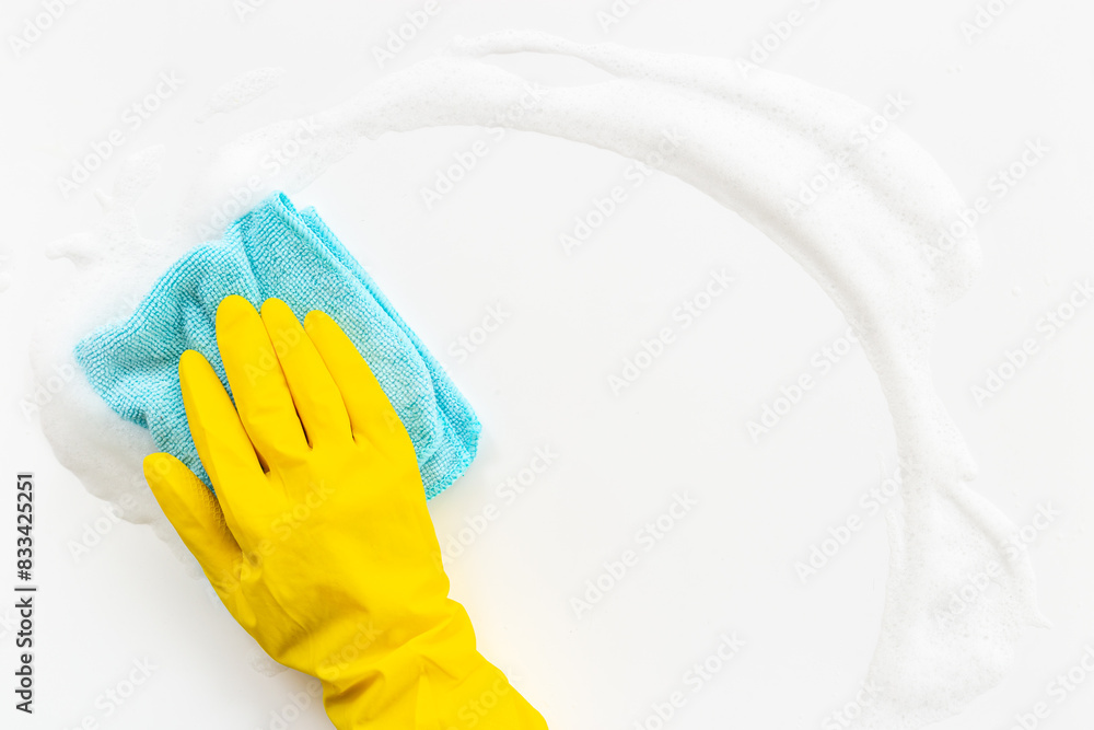 Female hands in rubber gloves cleaning with soap foam Female hands in rubber gloves cleaning with soap foam