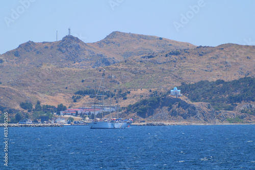 a large sailing ship with 4 masts anchored outside the port - Myrina, Lemnos island, Greece, aegean sea photo