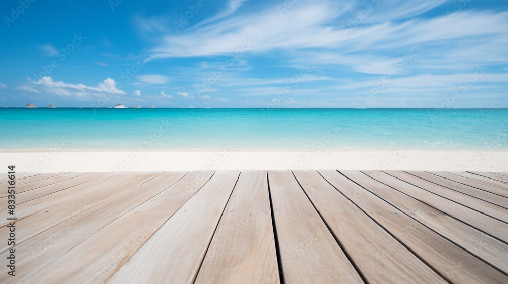 Fototapeta premium Tranquil Beachfront Scene with Clear Blue Ocean, Sky, and Wooden Deck