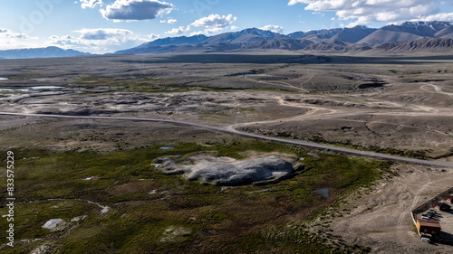 landscape of the surroundings of the village of Kosh Agach mountains with lakes and unusual landscapes from the height of a drone flight in the southern regions of Altai in May