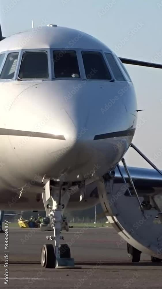 Private Business Corporate Executive Jet Parked with door open at Airport Private Business Corporate Executive Jet Parked with door open at Airport