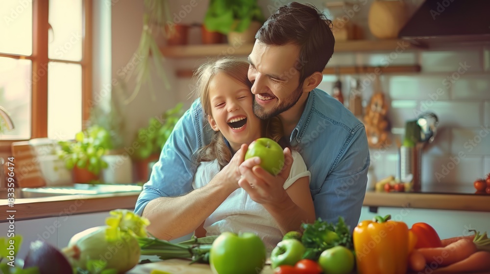 Fototapeta premium The father and daughter cooking