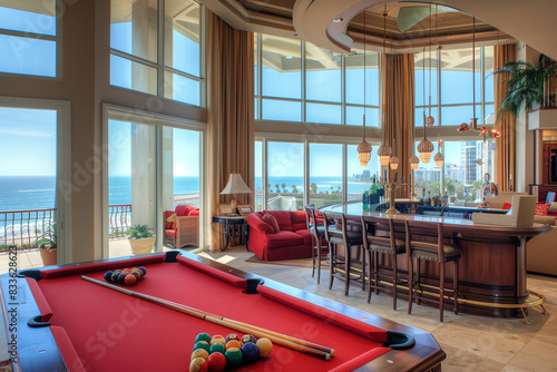 large living room with an island bar and pool table, floor-to-ceiling windows overlooking the ocean in San Diego, California, interior design magazine photograph, luxurious furnitu photo