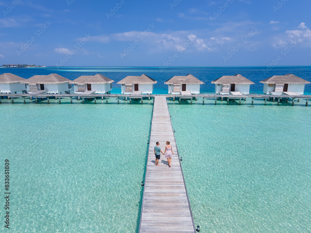 Fototapeta premium happy couple on honeymoon trip in Maldives, beach holidays travel