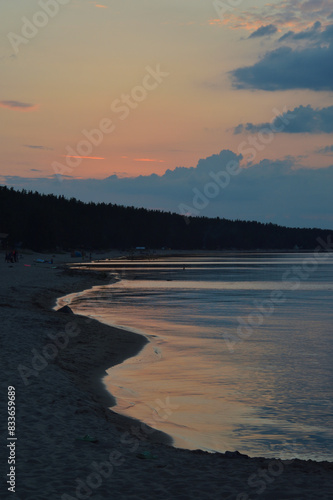 Shore of Lake Ladoga at sunset.