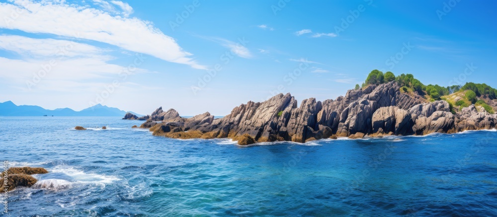 The hole stone island and the sea with blue sky. Creative banner. Copyspace image