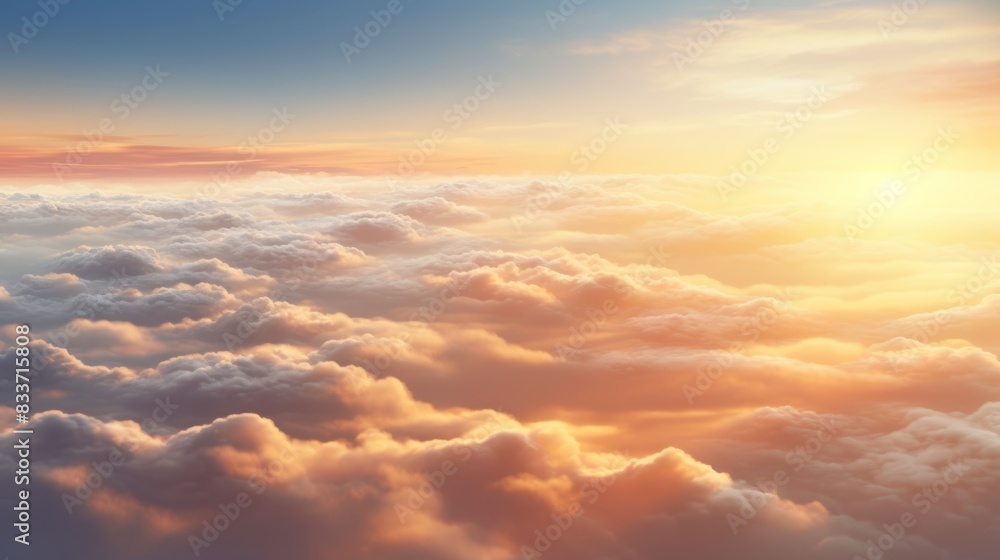 Gorgeous aerial view above the clouds, vibrant sunset with sunbeams cutting through the fog. Gorgeous aerial view above the clouds, vibrant sunset with sunbeams cutting through the fog.