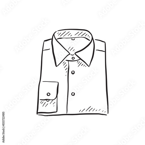A line drawing of a folded mens shirt. Hand drawn in black an white with shading in line format.