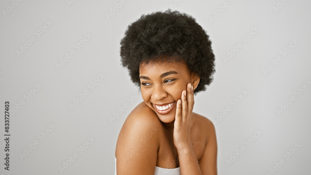 Portrait of a joyful african american woman with curly hair against a white background, embodying beauty and positivity. Portrait of a joyful african american woman with curly hair against a white background, embodying beauty and positivity.