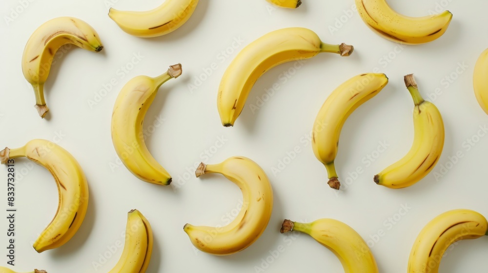 fresh yellow bananas on a white backdrop. fresh yellow bananas on a white backdrop.