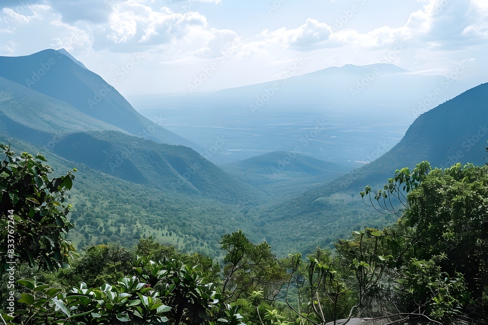 Fototapeta premium Majestic Mountain Range with Lush Valley Landscape