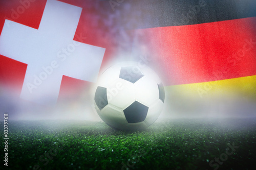 group A stage match , Switzerland vs Germany , Football Nation Flag and soccer ball on green grass