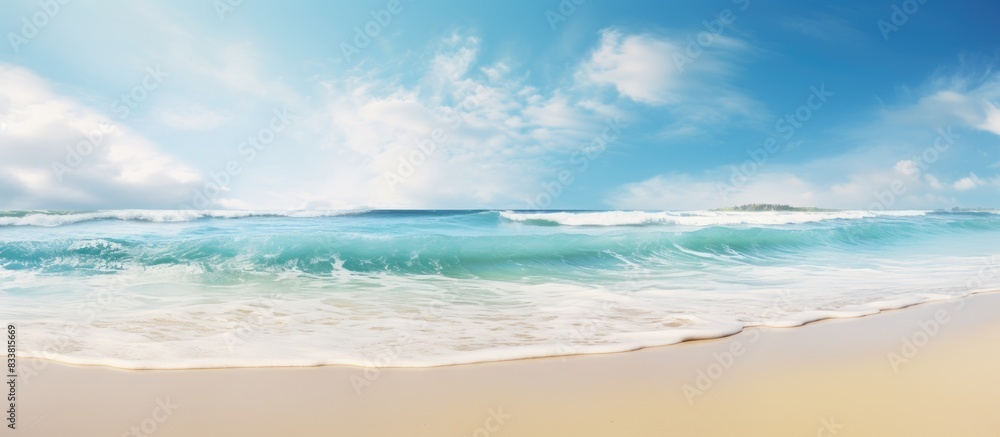 Summer vacation travel concept with a scenic seascape of waves gently lapping the sandy ocean coast, ideal for a tranquil getaway with copy space image.