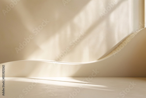 Simple abstract beige backdrop, beautiful light and shadow on wall, perfect for showcasing products