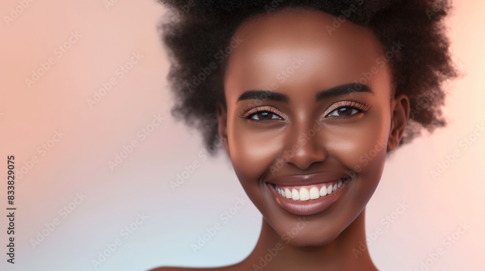 A close-up portrait of a Black woman with short afro hair smiling for a makeup campaign advert A close-up portrait of a Black woman with short afro hair smiling for a makeup campaign advert