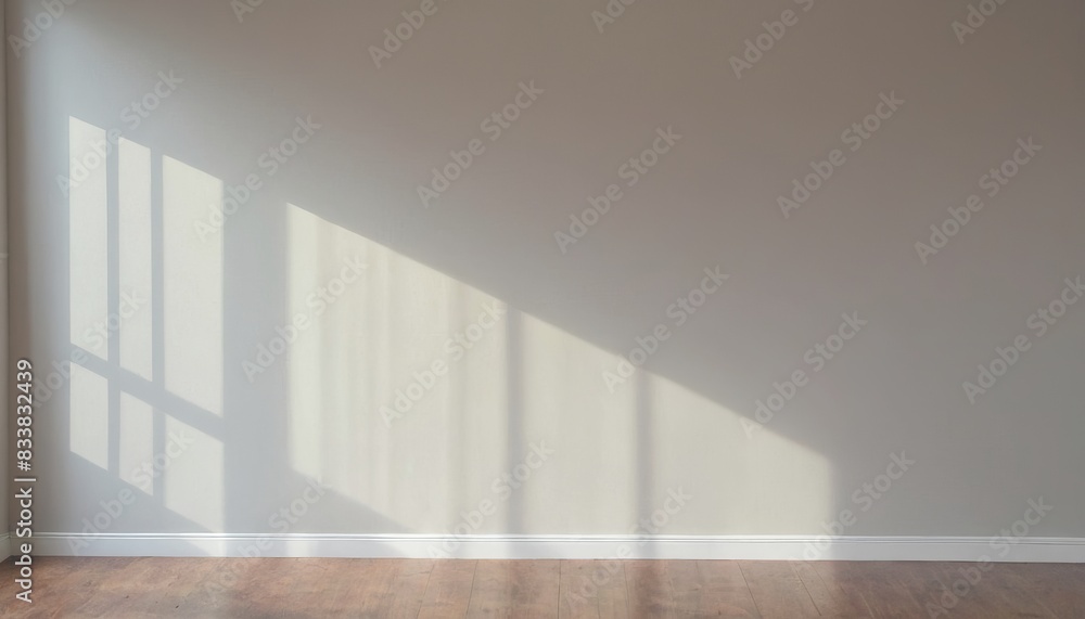 Rays of the sun fall on a white wall in an empty room, minimalist interior design and backgrounds, Meditation and mindfulness Rays of the sun fall on a white wall in an empty room, minimalist interior design and backgrounds, Meditation and mindfulness