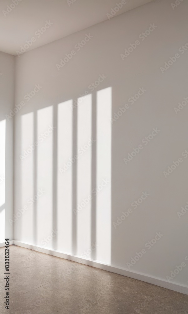 Fototapeta premium Empty wall and sun rays, minimalism and harmony in the interior. Interior design concept
