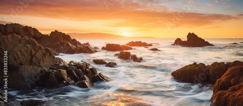 Sunset on the beach shore w...