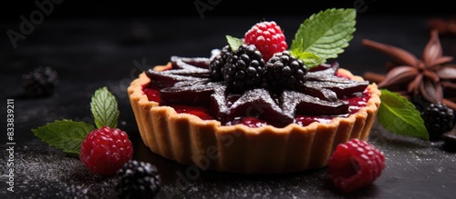 A Blackberry tart with a ga...