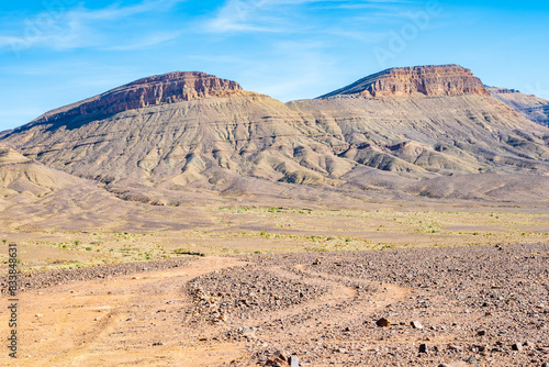 High peaks and desert arid landscape between Agdz and Tazzarine towns in Atlas Mountains, Morocco, North Africa photo