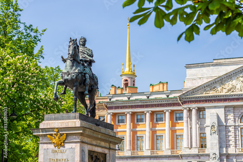 St. Petersburg, Russia, May 26, 2024: View of the Mikhailovsky Castle (Engineers' Castle) and the monument to Peter the Great in the historical center of St. Petersburg.