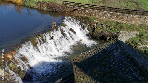 Waterfall in Rio de Onor, a beautiful village in the north of Portugal photo