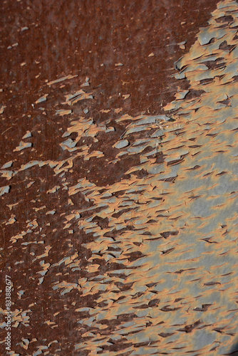Close up rusty, peeling, painted metal background