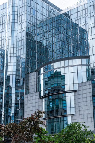 Glass facades of a modern office building in European quarter in Brussels, Belgium, Europe, vertical