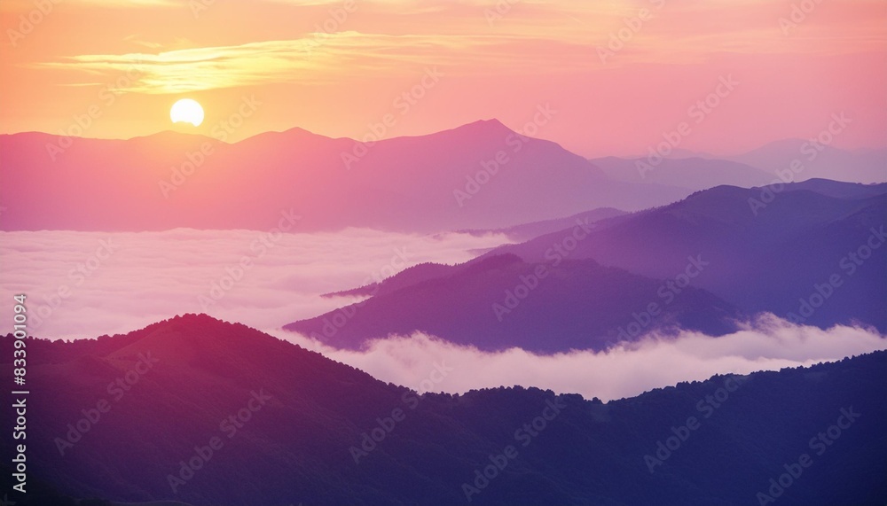 beautiful mountains in the pink foggy sunset abstract nature background
