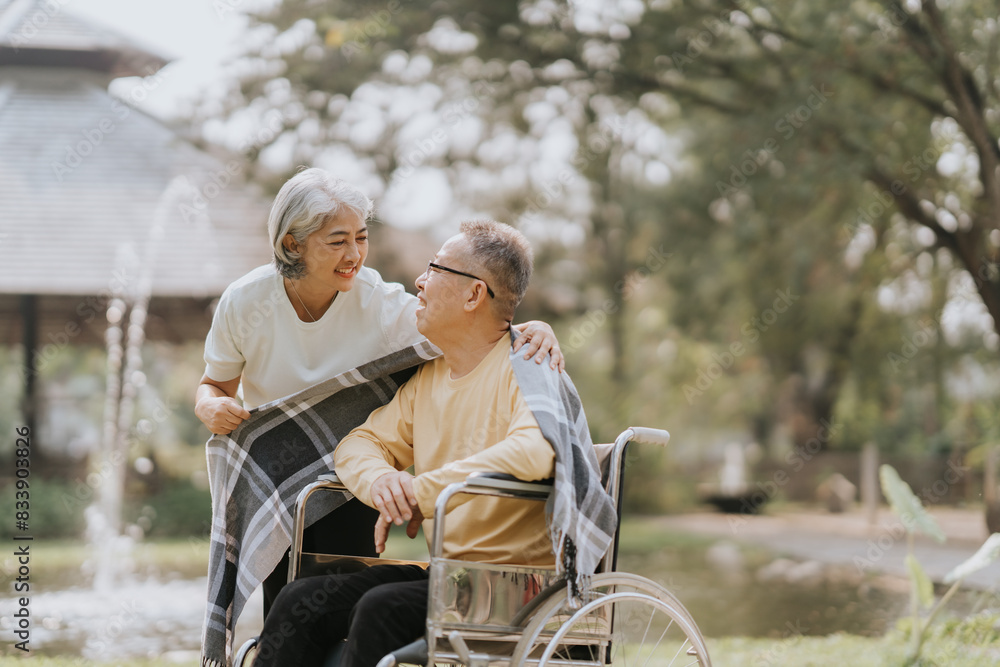 Elderly couple. Asian elderly couple giving love to each other smiling happily. Love and care for each other. Elderly couple. Asian elderly couple giving love to each other smiling happily. Love and care for each other.