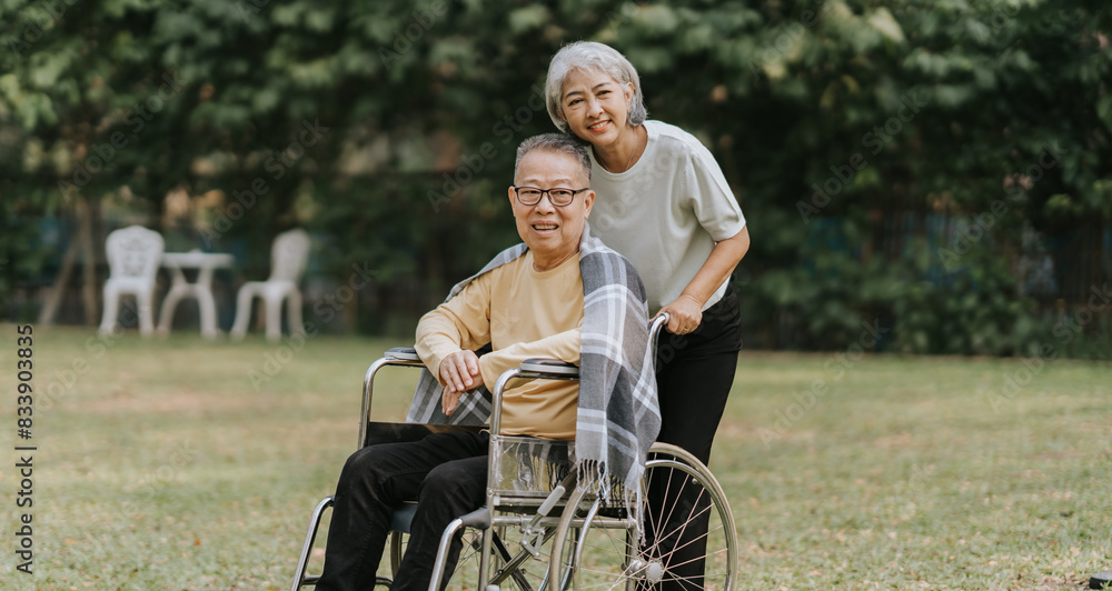 Elderly couple. Asian elderly couple giving love to each other smiling happily. Love and care for each other.