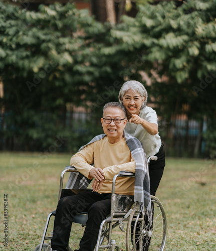 Elderly couple. Asian elderly couple giving love to each other smiling happily. Love and care for each other.