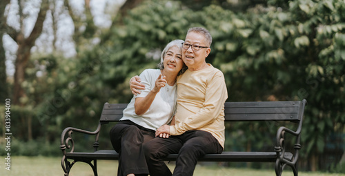 Elderly couple. Asian elderly couple giving love to each other smiling happily. Love and care for each other. © Kritdanai