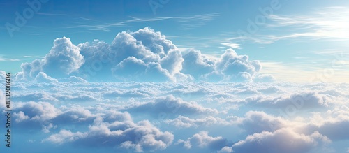 Sky and clouds create a scenic backdrop in the 'copy space image.'