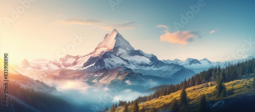 A scenic view of a majestic mountain at sunrise  with copy space image.