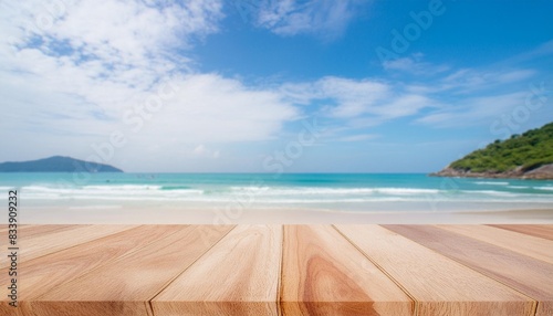 wood table top and blurred summer beach and sky background can used for display or montage your products