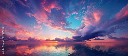 Take a moment to admire the beautiful evening sky, with a stunning blend of colors and a relaxing atmosphere. #copy space image