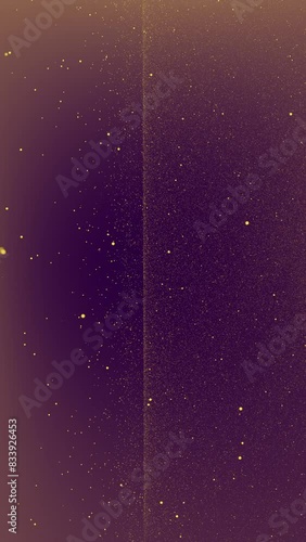 Gold tiny dots glitter on purple sand gradient background that formed in the right and dividing space into two parts. Vertical stars backdrop party or Christmas holidays concept with copy space