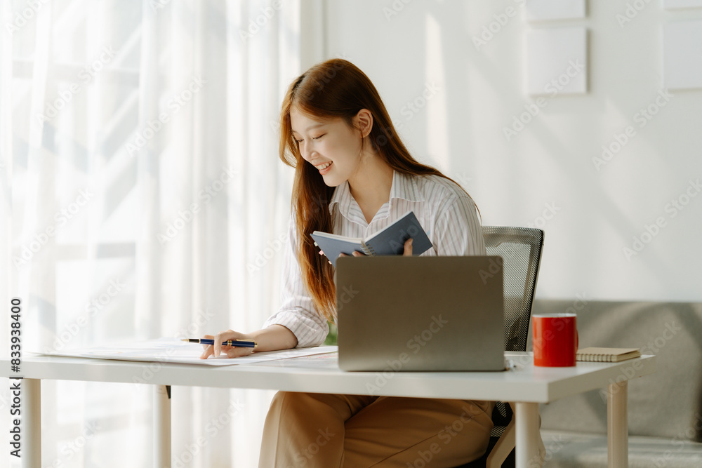 Happy cheerful cute beautiful business woman in office. Happy cheerful cute beautiful business woman in office.