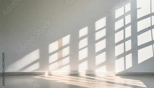 minimalist blurred natural light windows shadow overlay on wall paper texture abstract background minimal abstract light white background for product presentation