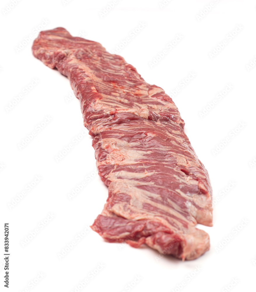 A Long Thin Raw Beef Flank Steak Isolated on a White Background A Long Thin Raw Beef Flank Steak Isolated on a White Background